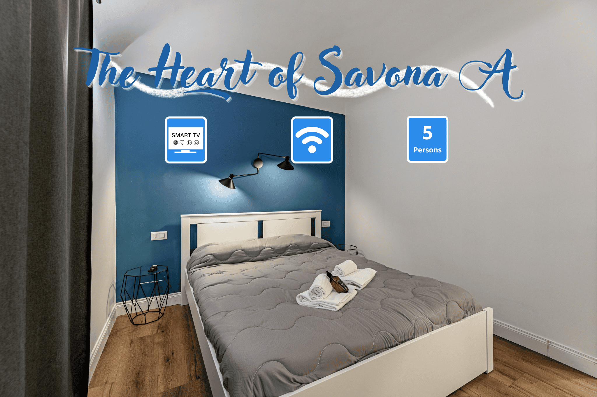 Centro Savona vista della camera da letto matrimoniale, aria condizionata, asciugamani e biancheria.