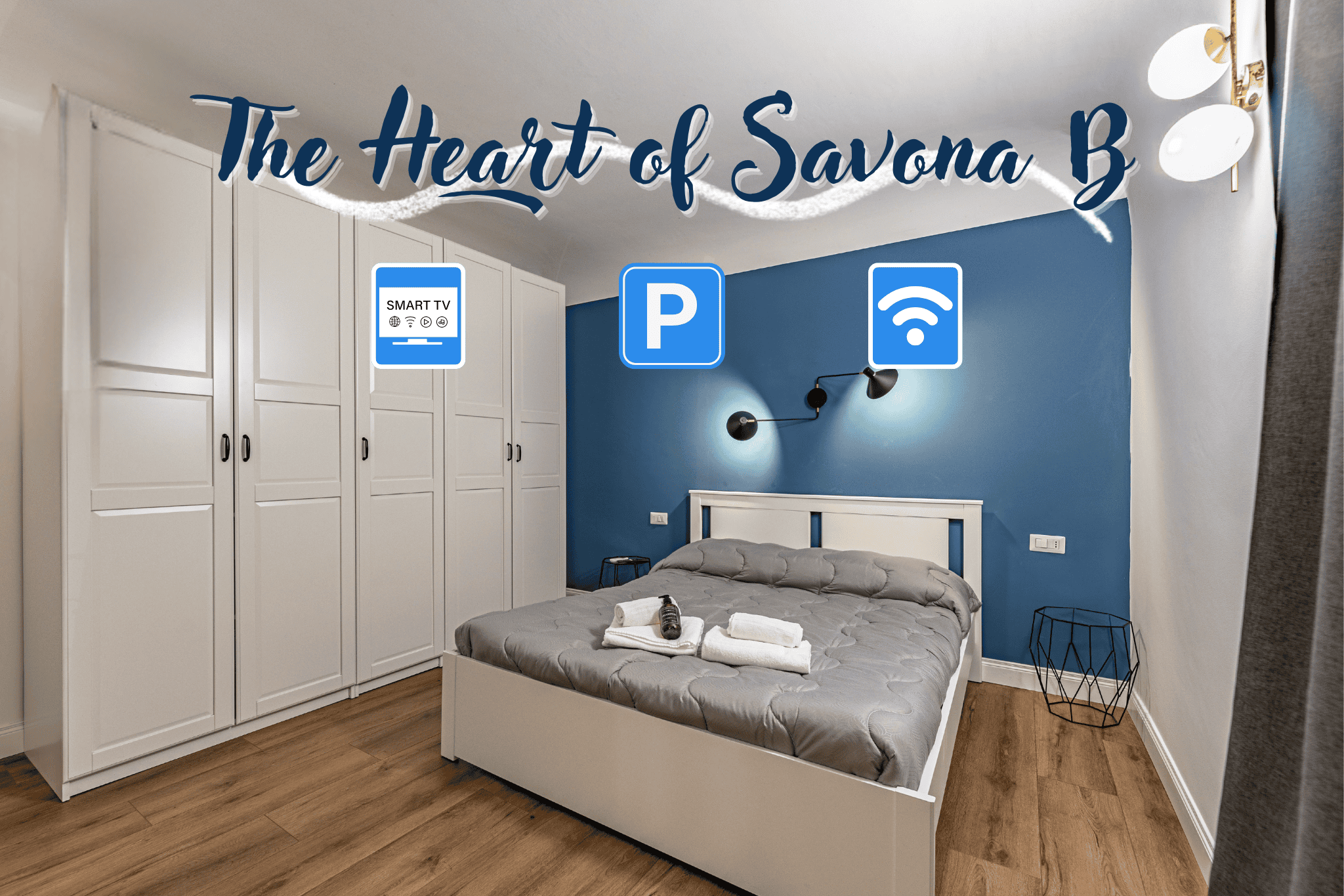 Centro Savona vista della camera da letto, asciugamani e biancheria, aria condizionata, smart tv